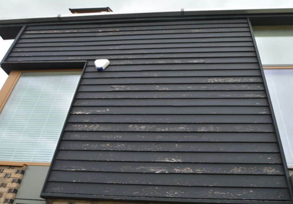 Paint failure on the external wood of a house