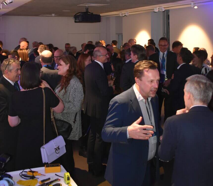 Picture shows Hawkins guests conversing in the exhibitions room