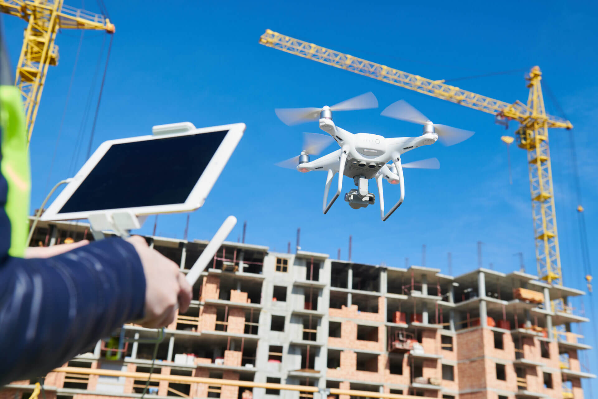 Drone being operated on a construction site