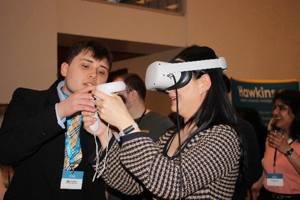 Image of a guest trying out our VR exhibit with investigator Inigo Beckett