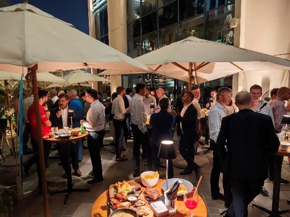 Image of guests networking at our Dubai reception